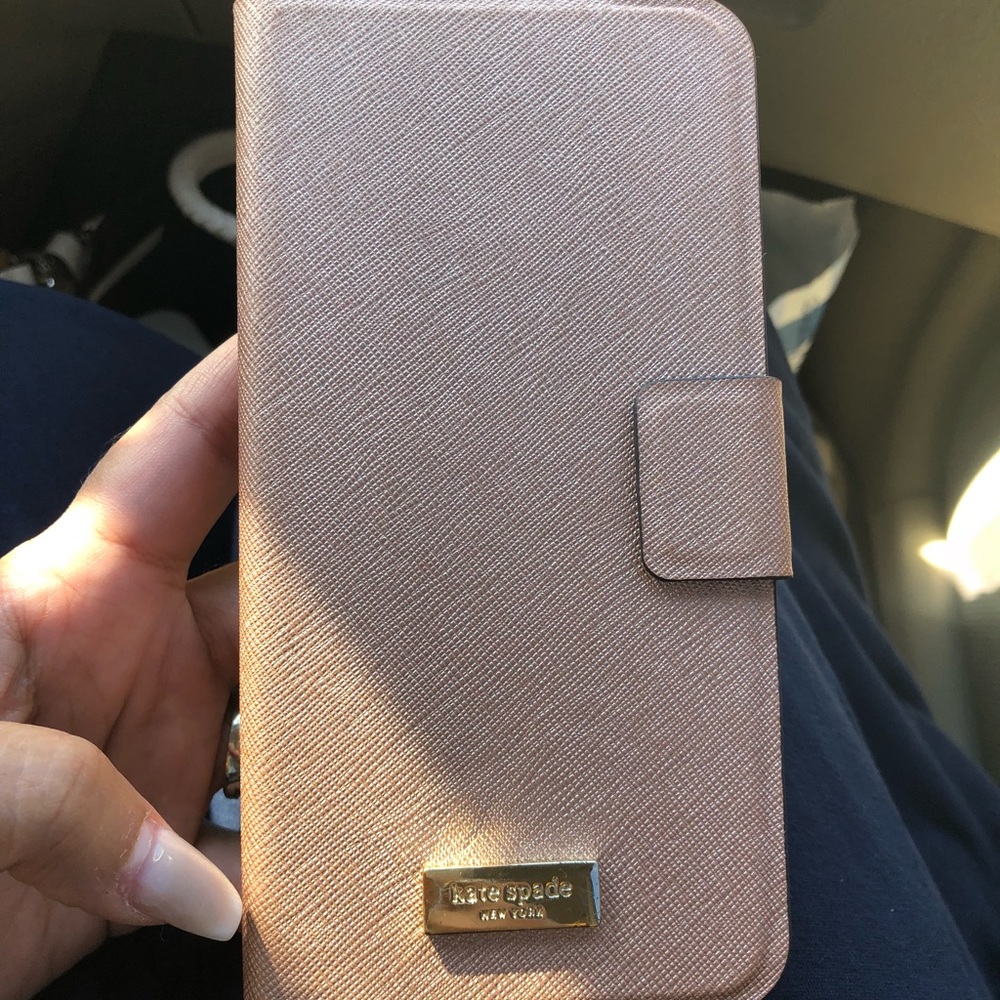 Pre own iPhone 6 Plus Kate Spade wallet case